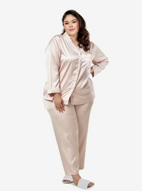 A woman dressed in Ivory Premium Satin Pyjamas