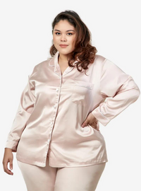 A woman dressed in Ivory Premium Satin Pyjamas