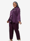 A woman dressed in Purple Premium Satin Pyjamas