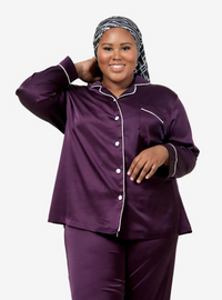 A woman dressed in Purple Premium Satin Pyjamas