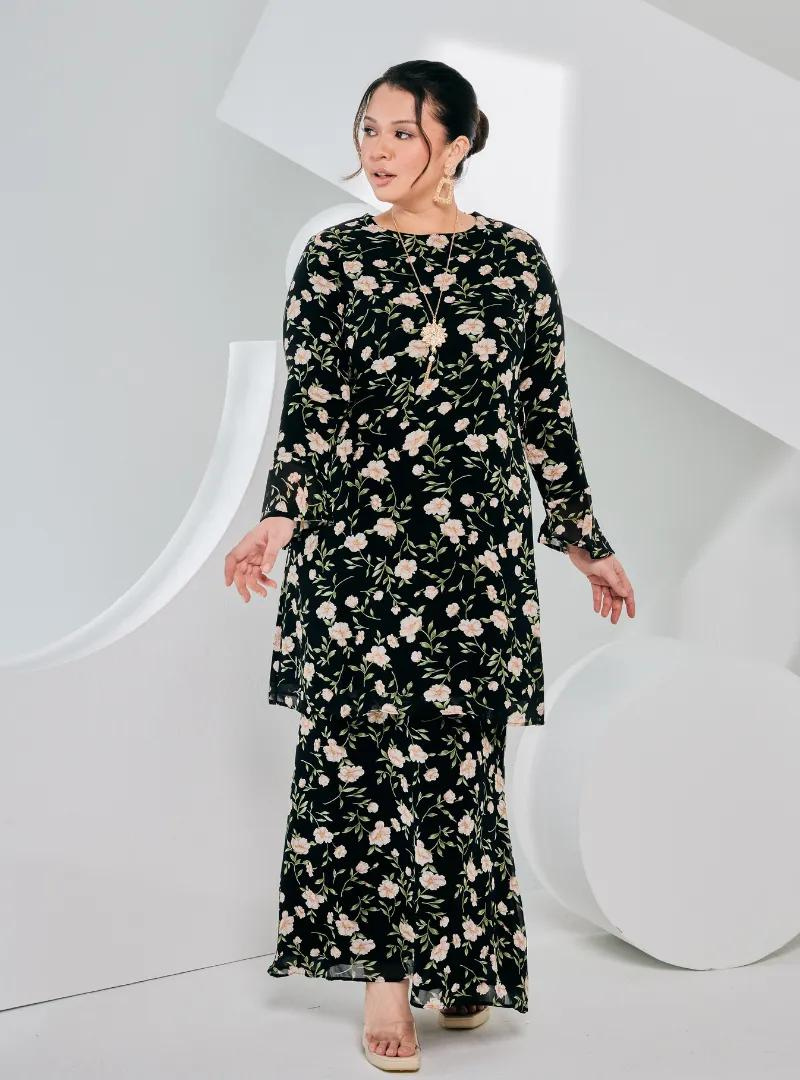 A woman dressed in Black Printed Chiffon