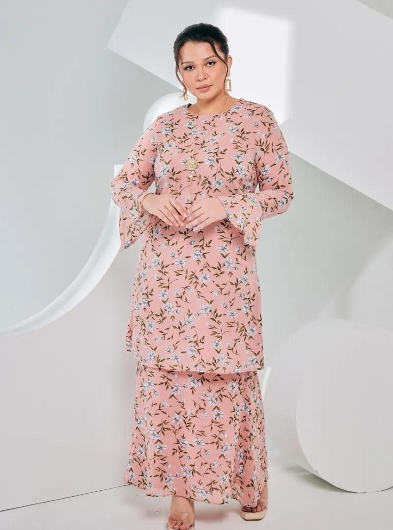 A woman dressed in Dusty Pink Printed Chiffon