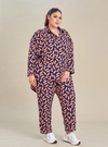 A woman dressed in Navy Peach Printed Rayon Oversized Shirt