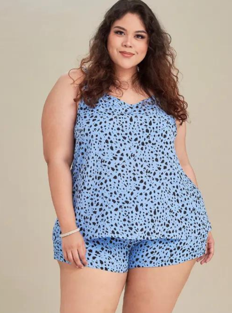 A woman dressed in Leopard Blue Printed Rayon Spaghetti Top