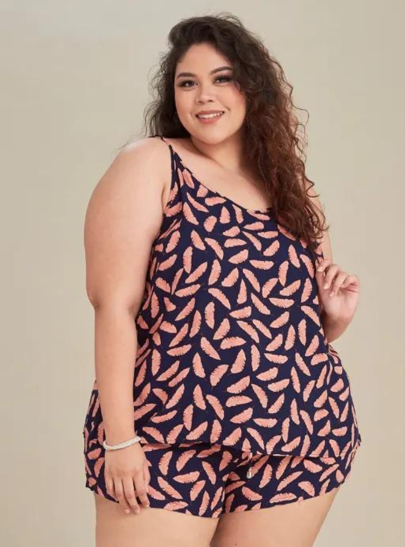 A woman dressed in Navy Peach Printed Rayon Spaghetti Top