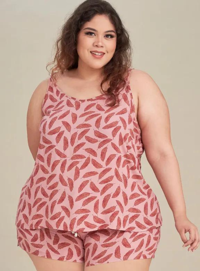A woman dressed in Pink Leaves Printed Rayon Spaghetti Top