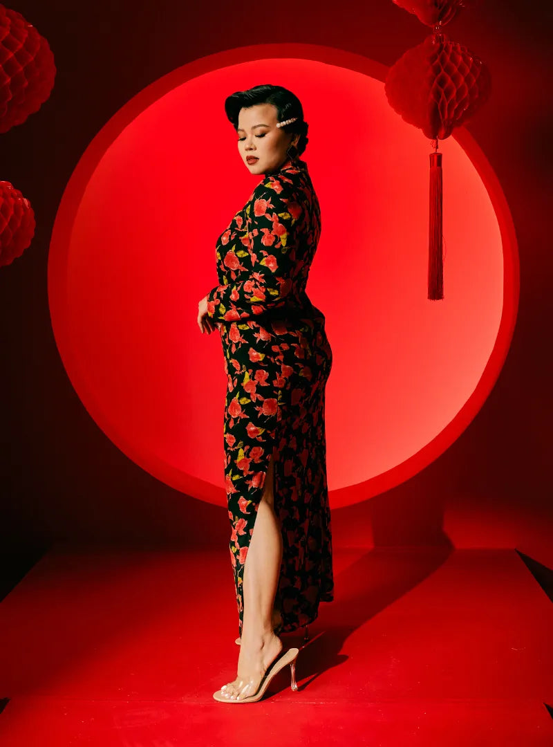 A woman dressed in Red Rose Han Jie Cheongsam Dress