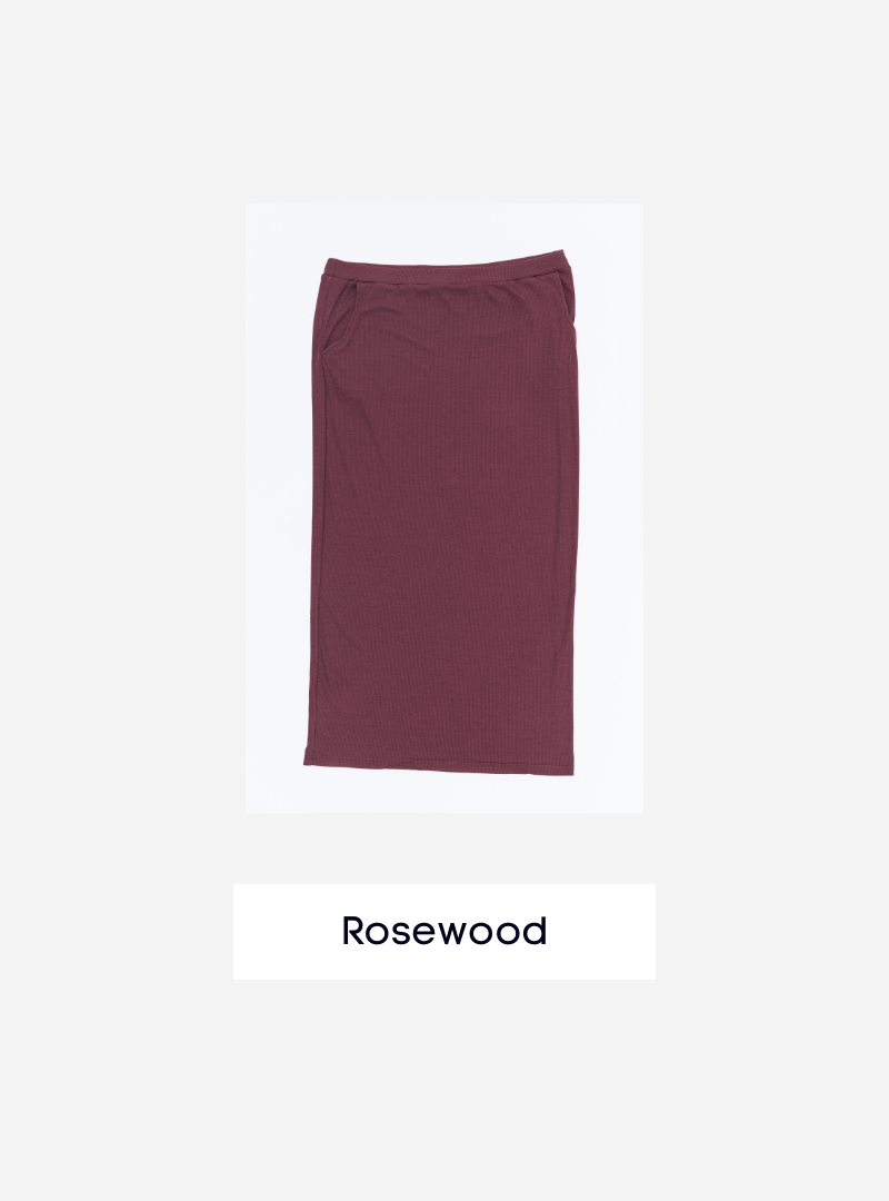 A woman wearing Rosewood Luna Pencil Skirt