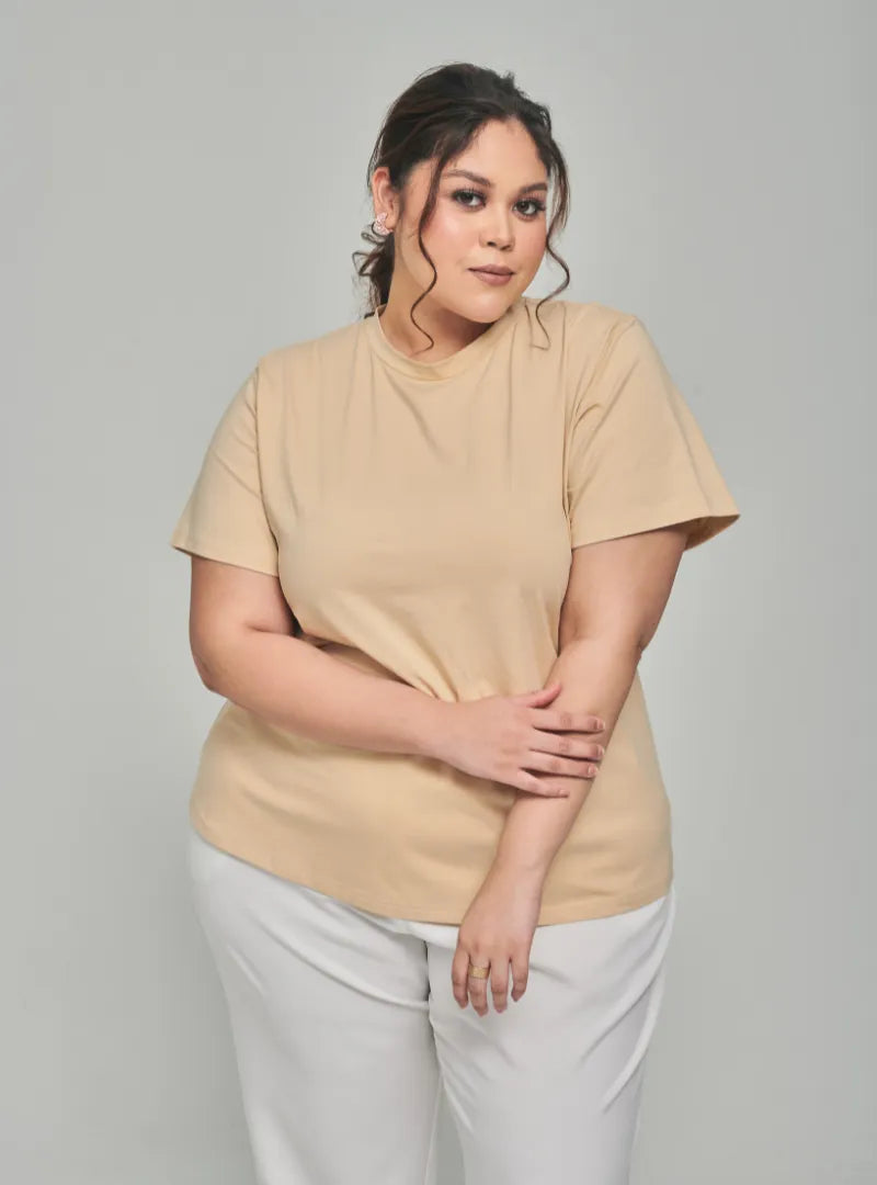 A woman dressed in Skin Basic Cotton Tee