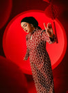 A woman dressed in Scarlet Red Cheongsam Eyelet