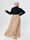 A woman wearing Sand  Basic Pleated Skirt