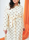 A woman dressed in Skin Dotted Longline Printed Shirt Dress