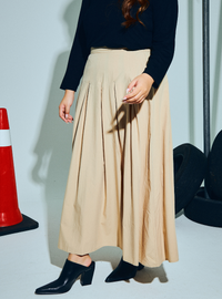 A woman wearing Skin Harper Poplin Skirt