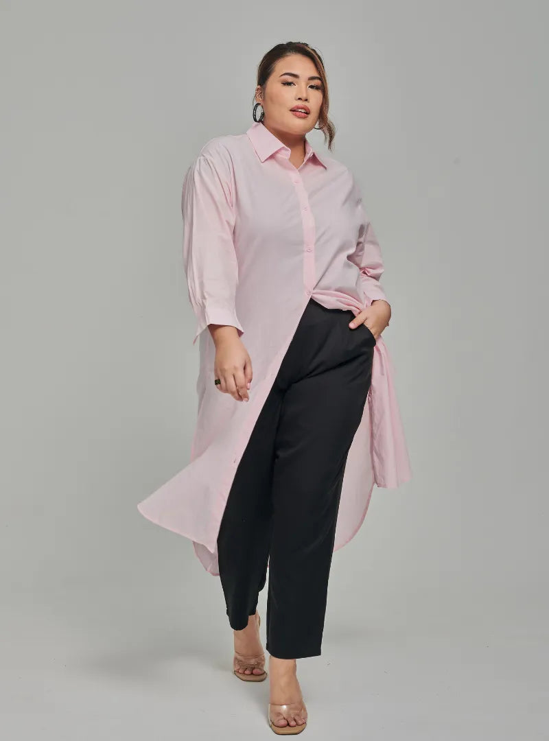 A woman dressed in Soft Pink Longline Oversized Cotton Shirt Dress