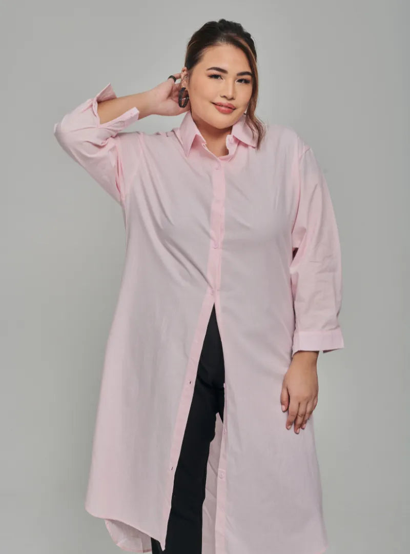 A woman dressed in Soft Pink Longline Oversized Cotton Shirt Dress