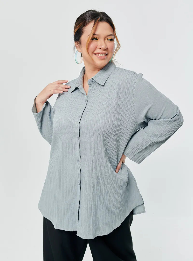 A woman dressed in Stone Blue Textured Shirt