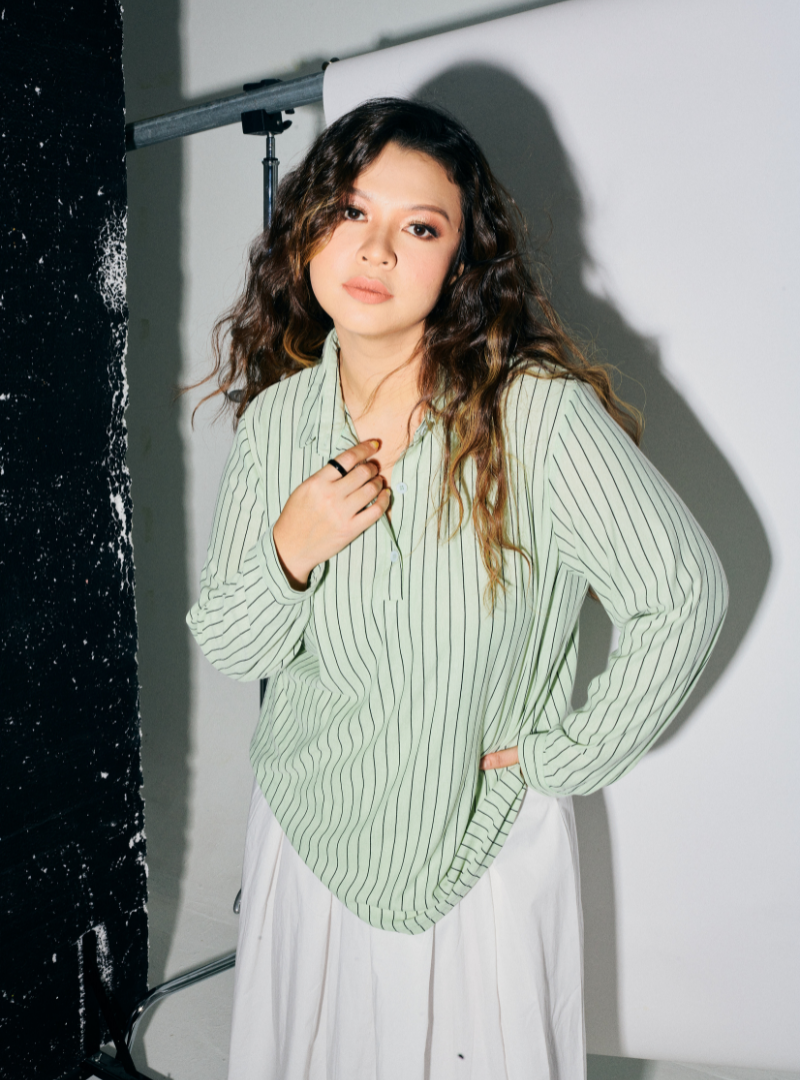 A woman dressed in Mint Green Regular Striped Slim FIt Polo