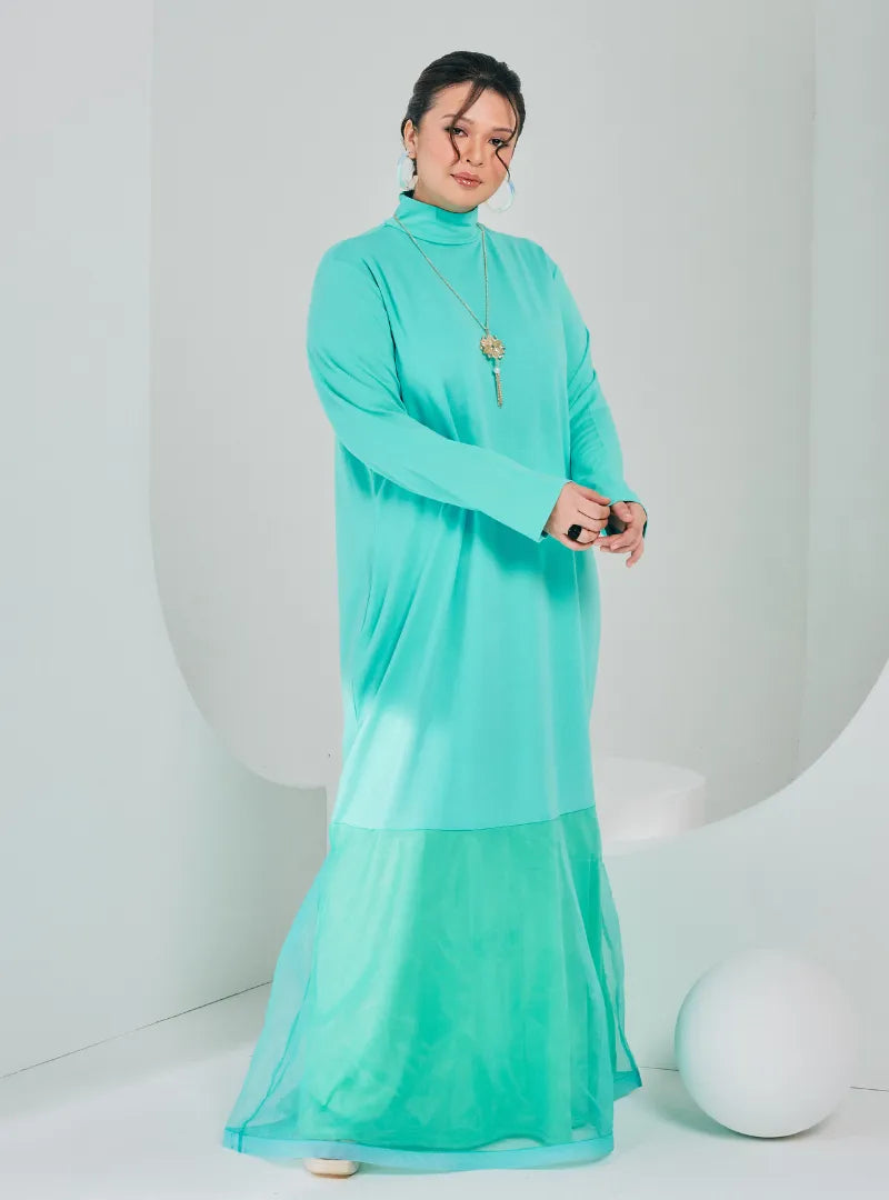 A woman dressed in Tifanny Blue Ms Lana High Neck Organdy Dress