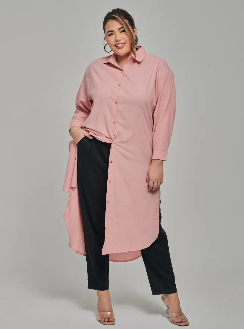 A woman dressed in Toffee Longline Oversized Cotton Shirt Dress