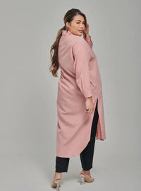 A woman dressed in Toffee Longline Oversized Cotton Shirt Dress