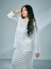 A woman dressed in White Naddy Mandarin Collar Slim Fit Polo Shirt