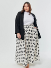 A woman wearing White Paw Printed Cotton Maxi Skirt