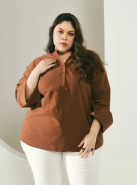 A woman dressed in Walnut Jasper Mandarin Collar Basic Shirt