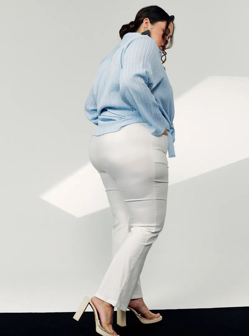 A woman wearing White Ms Nadia Bootcut Trouser