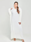 A woman dressed in White Tun Aimellia Pleated Maxi Dress