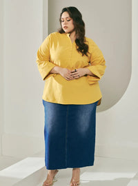 A woman dressed in Yellow Jasper Mandarin Collar Basic Shirt