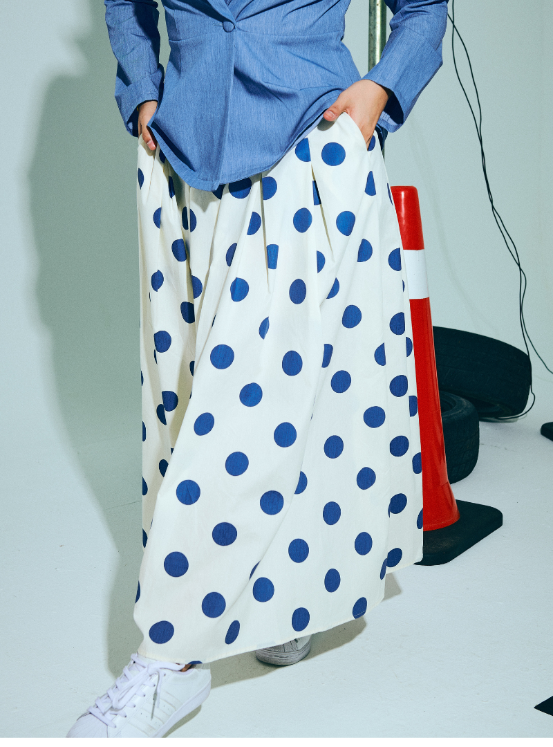 A woman wearing Blue Polka Dotted