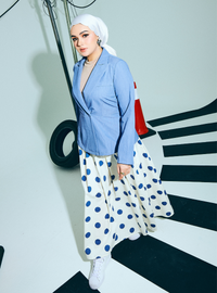 A woman wearing Blue Polka Dotted