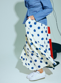 A woman wearing Blue Polka Dotted